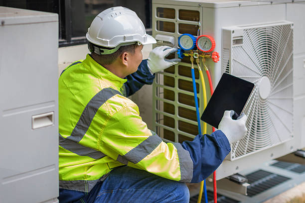 Professional Heat Pump Repair technician working in Gasport, NY
